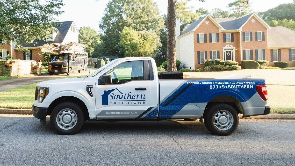 A Southern Exteriors truck parked on the street in a North Atlanta neighborhood.