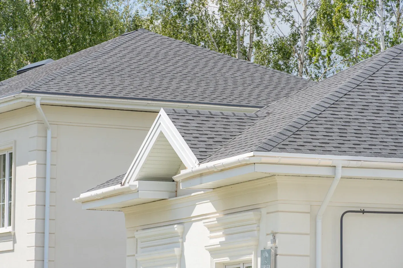 A side view of a home, showing newly installed shingles.