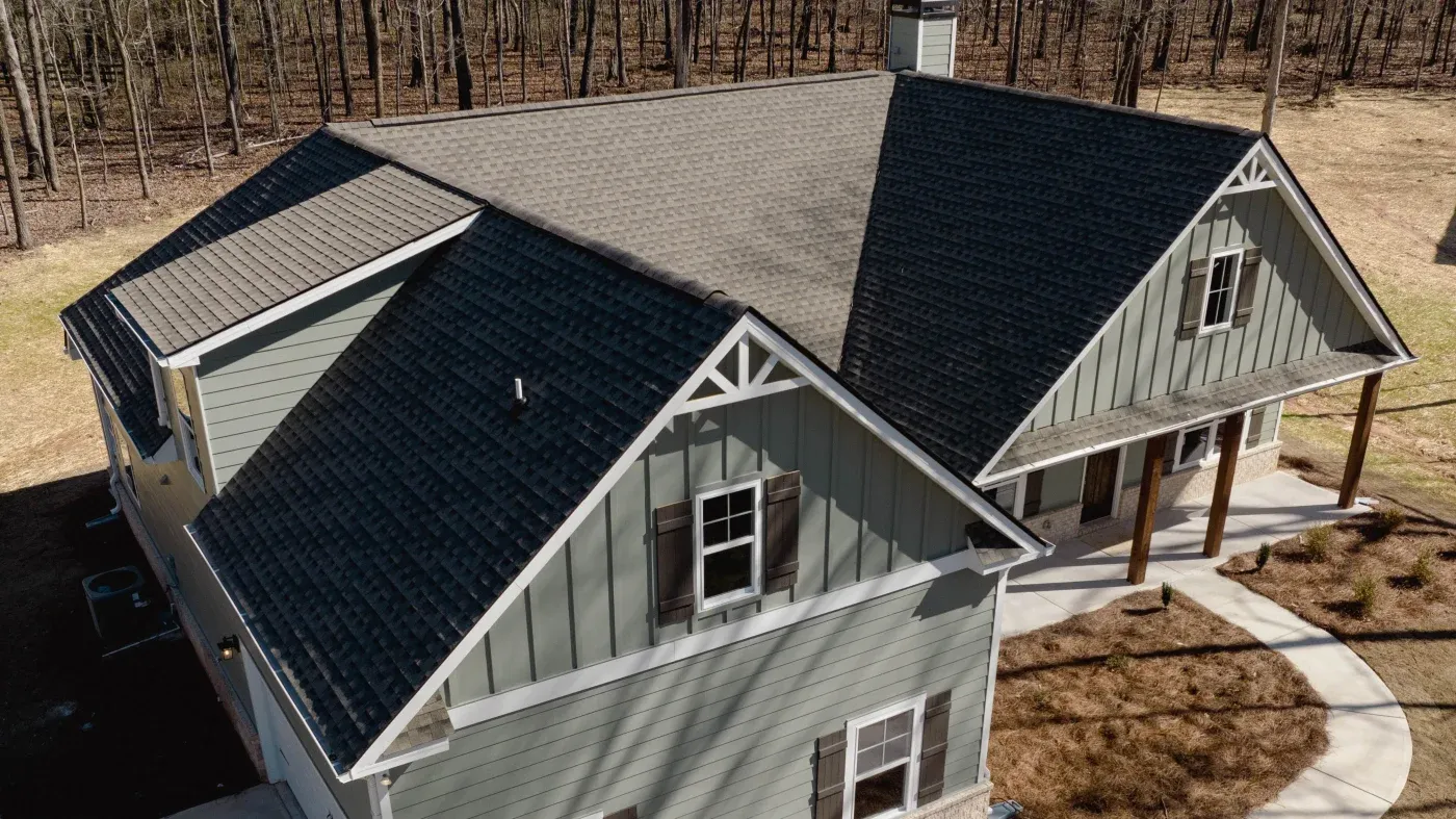 Aerial view of an asphalt shingle roof on a North Atlanta home.