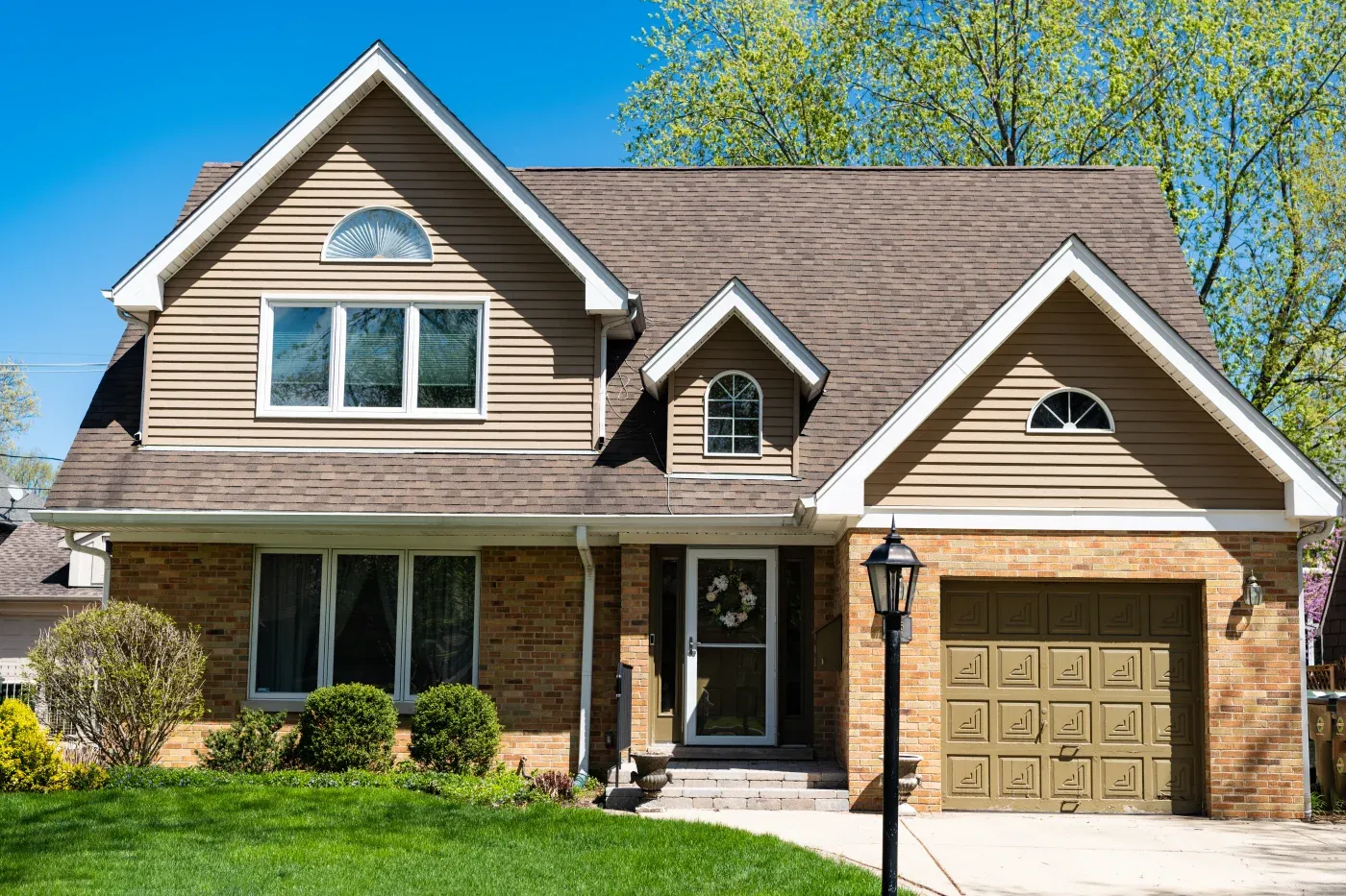 Residential Building Suburban House Architecture In Neighborhood Of America With Garage