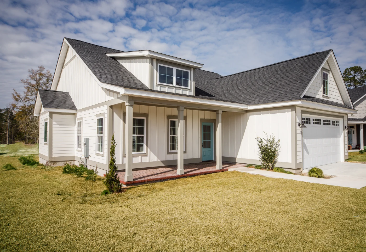 Modern New Construction White Siding Cottage House For Sale In Suburbs With Turquoise Door