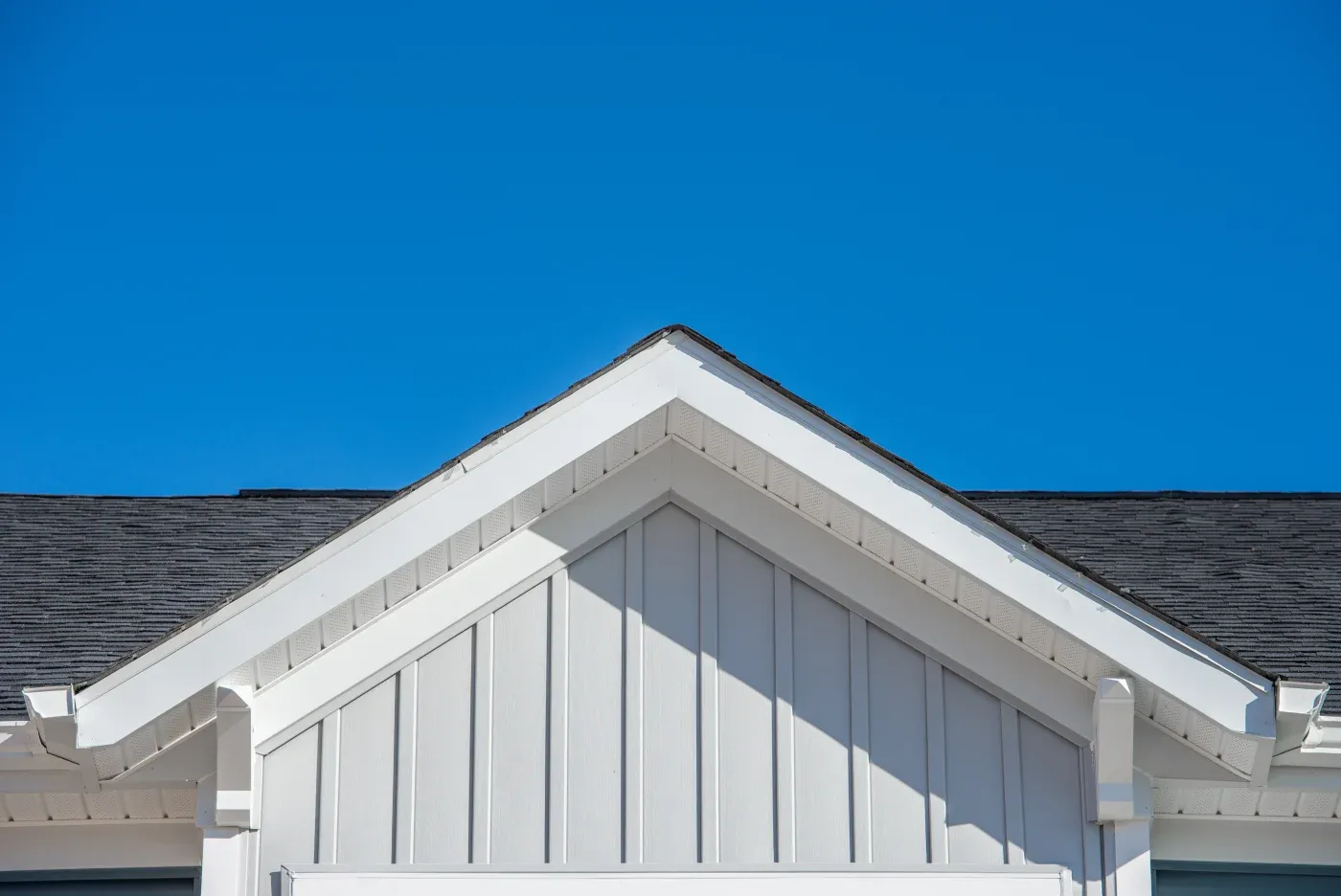 A view of a residential building with a complete, clean exterior