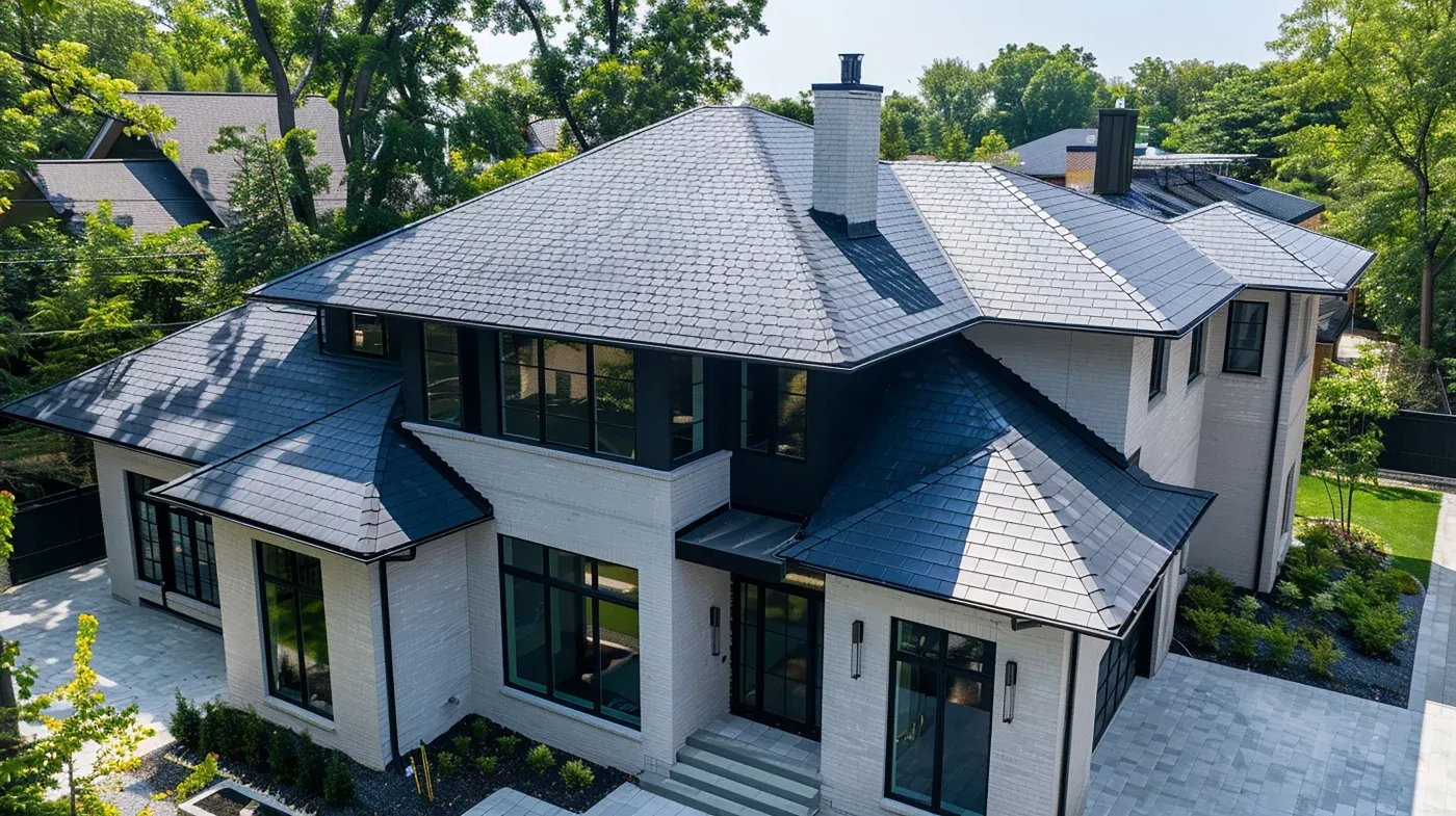 A two-story home in Chamblee, GA with a newly installed metal roof and white trim.