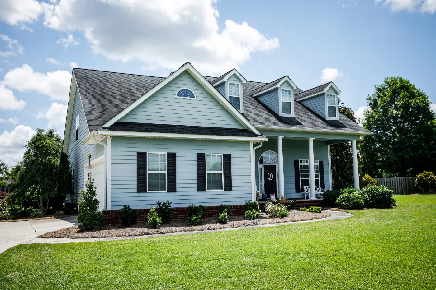 Blue Traditional Siding House Home In Suburbs Front Facing With Curb Appeal Blue Traditional Siding House Home In Suburbs Front Facing With Curb Appeal