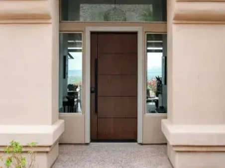 8-foot Signet nutmeg front door with black pull bar in Jackson, GA | Southern Exteriors