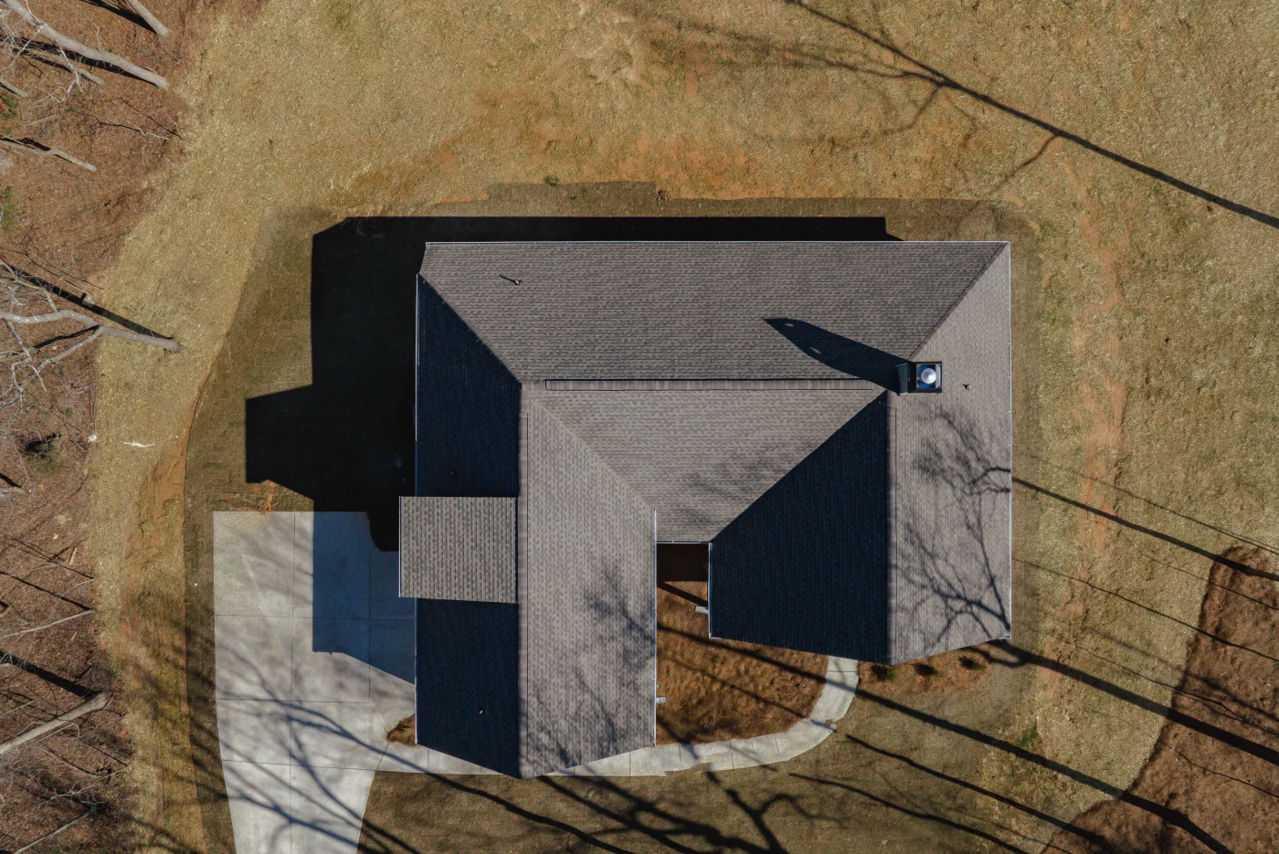 An aerial view of an asphalt shingle roof on a Chattanooga home